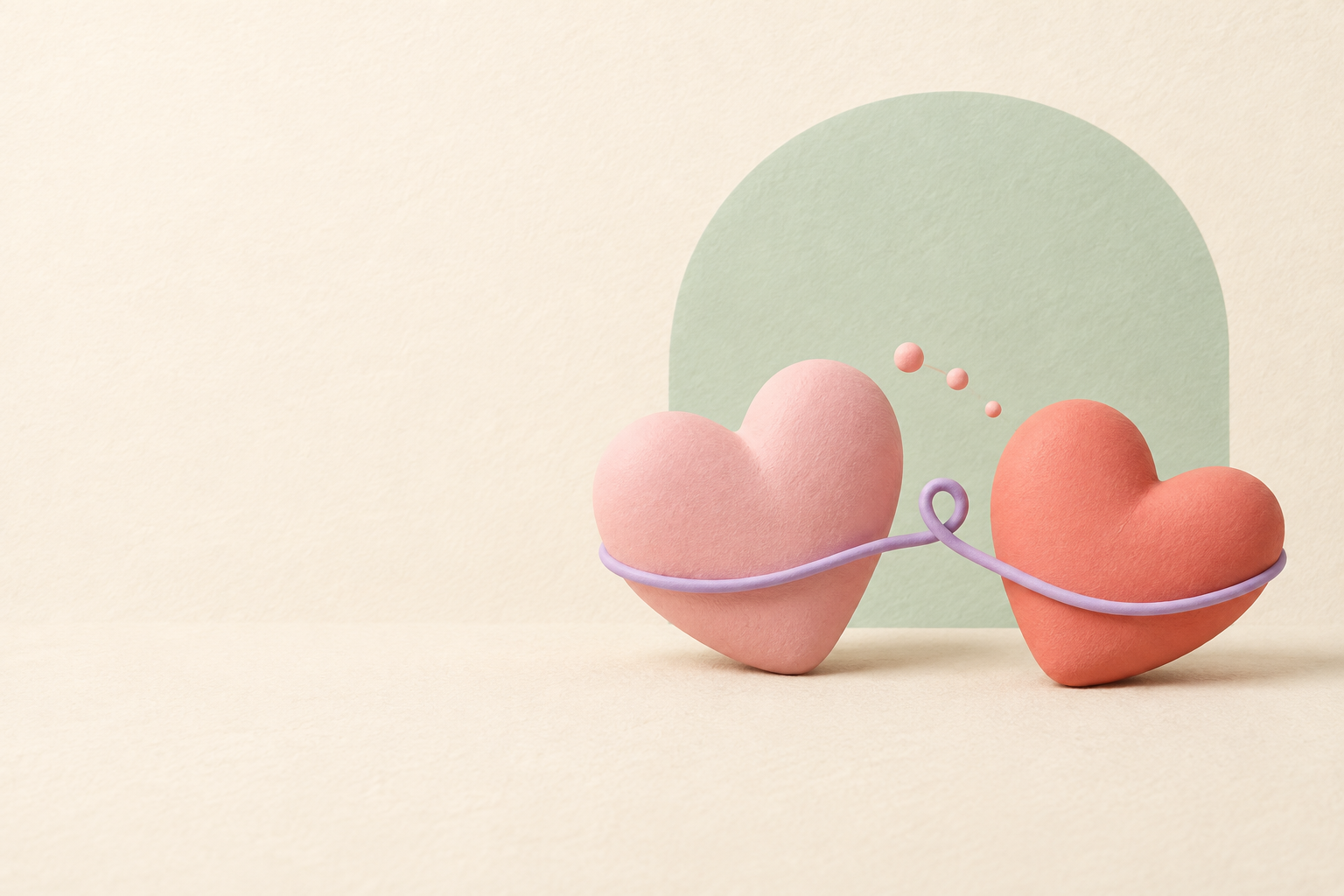 Two illustrated pink hearts leaning together